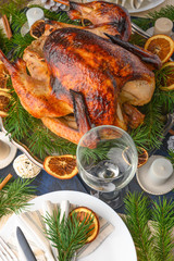 Festive turkey, on a served table, vertical frame