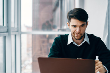 man working on laptop