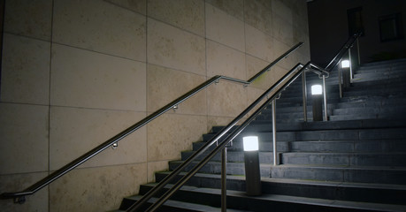 Night time steps outside an office block and apartment complex creating a moody atmosphere