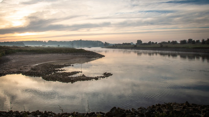 Misty morning at the river IJssel near Dieren, the Netherlands
