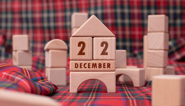 December 22 written with wooden blocks
