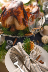 Thanksgiving and holiday. Braised turkey on the served table. Vertical frame.