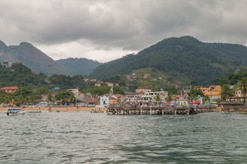 Fototapeta na wymiar Conceicao de Jacarei city in the hills from the boat, Brazil, South America
