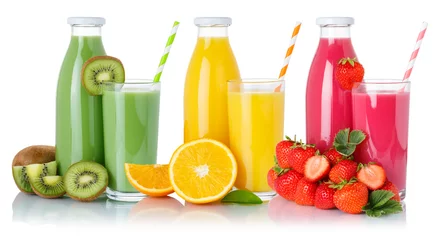 Poster Fruit juice drink green smoothies orange juices glass and bottle isolated on white © Markus Mainka