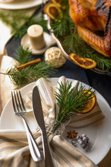 Thanksgiving and holiday. Braised turkey on the served table. Vertical frame.