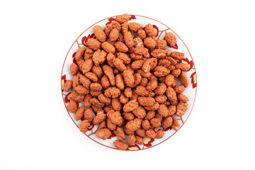 Kandierte Erdnüsse auf einem Teller