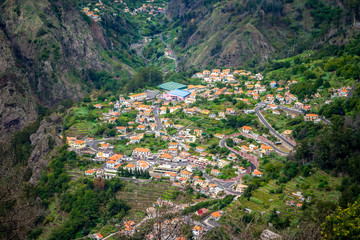 Fototapeta na wymiar Curral das Freiras - Beautiful view of mountain range in Madeira Island, Portugal
