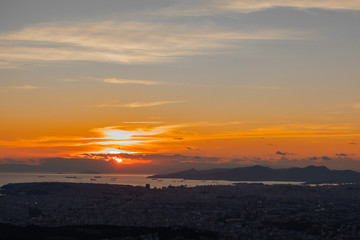 Sunset in Athens on a cloudy sky with a city view from Lycabettus hill