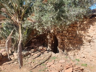 An abandoned old house built of stone and mud is a vandal