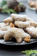 Christmas butter homemade cookies on dark background. Selective focus, effect toning.