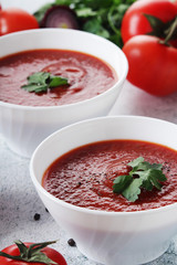 Two plates with gazpacho - traditional Spanish tomato soup	