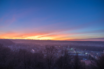 Sunset over a small european city in autumn