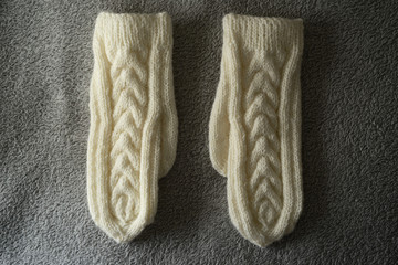 Fototapeta na wymiar white handmade mittens