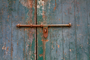 An old mottled wooden door