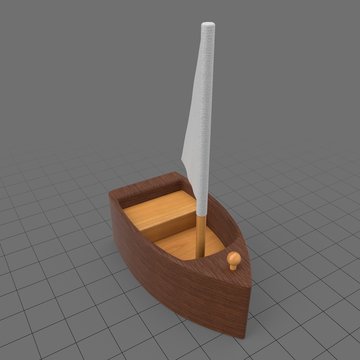 Small wooden toy sailboat
