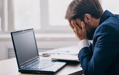 man working on his laptop