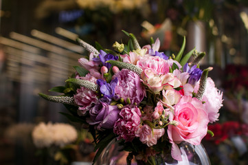Beautiful Bouquet. Spring flowers in the cold dark room of the flower shop