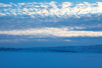 Fototapeta na wymiar blue winter scenery with low clouds