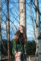 young pretty sensual girl with fashion makeup posing in birch tree forest, lifestyle people concept