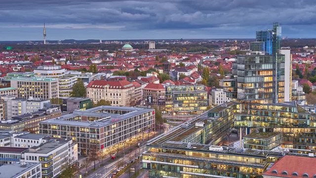 Beautiful evening aerial view of Hannover skyline cityscape. Time lapse.