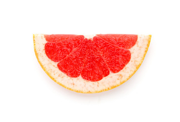 Fresh cut grapefruit on white background