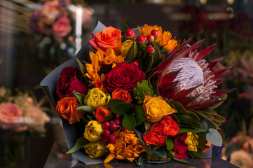 Beautiful Bouquet. Spring flowers in the cold dark room of the flower shop