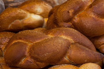 white bread and challah for saturday meal fresh and tasty pastries for the table