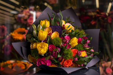 Beautiful Bouquet. Spring flowers in the cold dark room of the flower shop