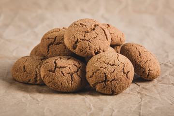 Chestnut cookies on brown background