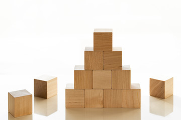 Blocks on white in the form of stairs. Business concept.