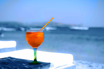 Orange drink at the beach.