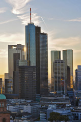 The Skyline of Frankfurt on the Main, in front of the sunset. 