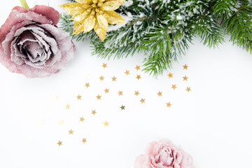 Christmas wreath with pink rose and golden flower and little stars 