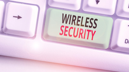 Writing note showing Wireless Security. Business concept for prevention of unauthorized access or...