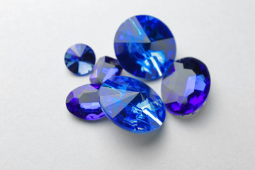 Precious stones for jewellery on light background