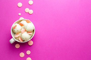 Cup with tasty ice-cream on color background