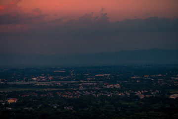 Blurry background Of the natural, high angle view From the viewpoint, you can see the colorful sky and see the houses surrounded.