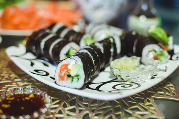 process of making homemade sushi roll