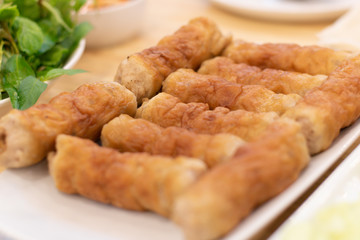 Vietnamese Meatball Wraps or Pork Cubes  Arranged on the plate.