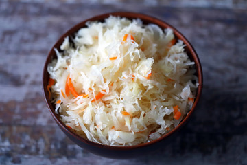 Sauerkraut in a bowl. Probiotics and fermented foods. Selective focus.