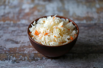 Sauerkraut in a bowl. Probiotics and fermented foods. Selective focus.