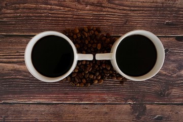 cup of coffee on wooden background