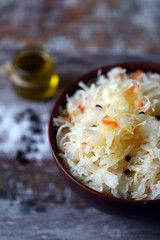 Sauerkraut in a bowl. Probiotics and fermented foods. Selective focus.