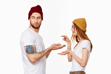 young couple in t-shirts chatting