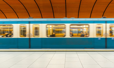 Fototapeta premium Munich u-bahn subway station with futuristic design and orange vibrant colors