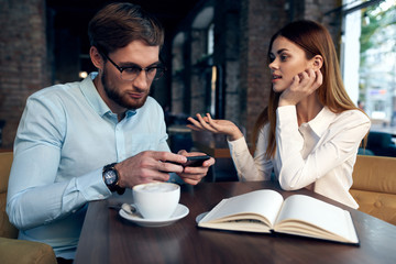 young couple in cafe