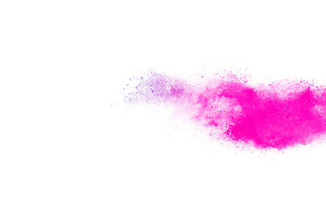 Fototapeta premium Freeze motion of purple color powder exploding on white background.
