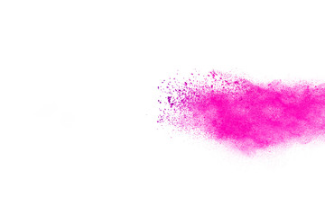 Freeze motion of purple color powder exploding on white background.