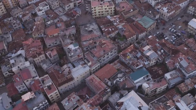 Drone shot looking down over Mombasa Oldtown Building rooftops