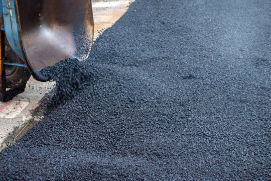 Urban City Street Black Top, Tarmac, Asphalt Patch Up Work And Repairs Wheelbarrow.